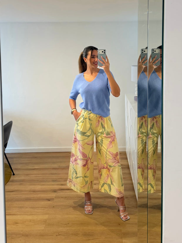 Calça floreada amarela