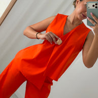 Conjunto laranja com botão