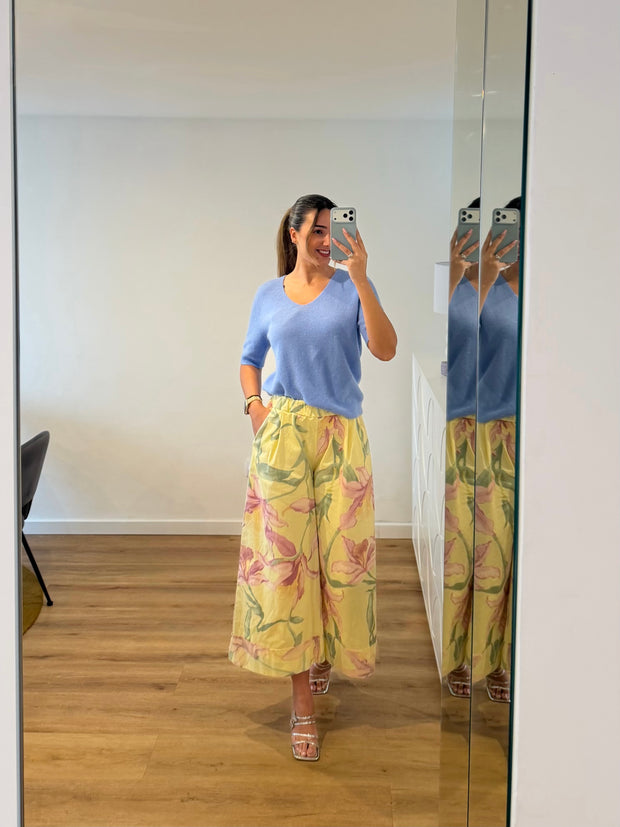Calça floreada amarela