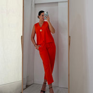 Conjunto laranja com botão