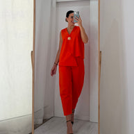 Conjunto laranja com botão